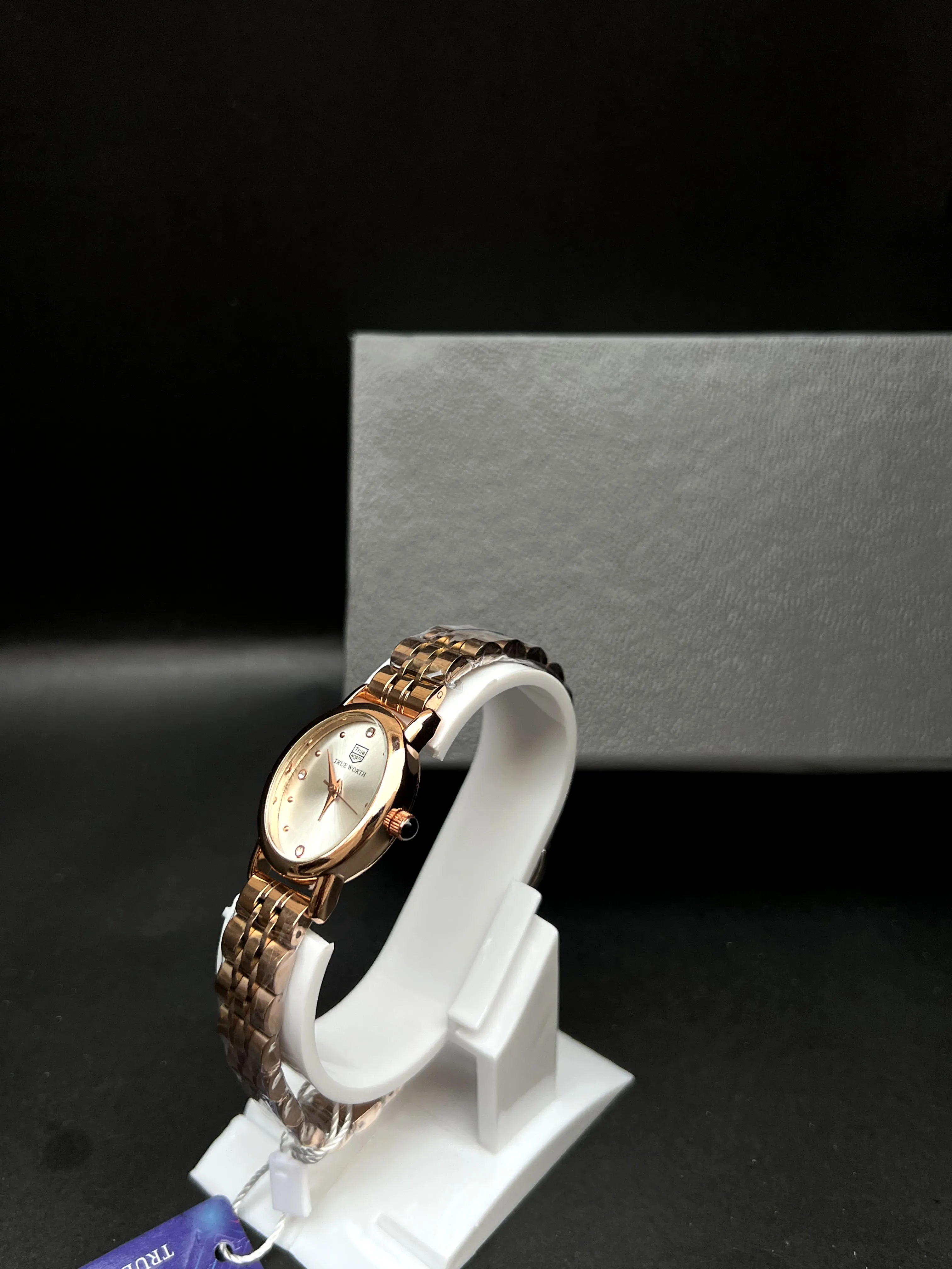 True Worth Rose Gold Rectangular Bracelet Watch with Champagne Dial