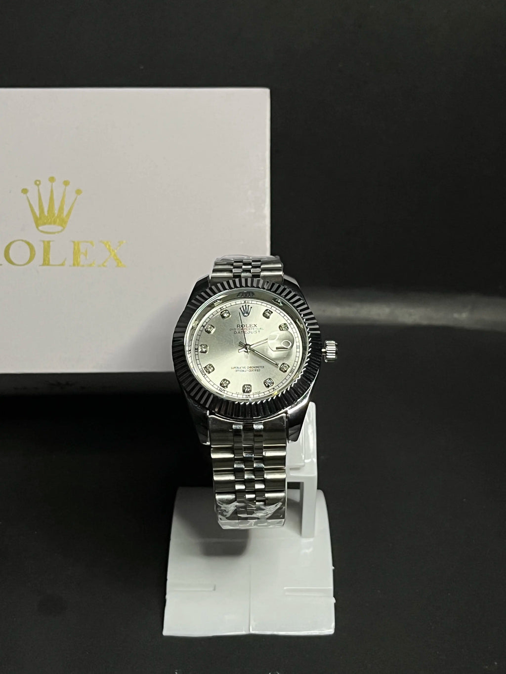 Rolex Datejust, Silver dial with diamond-set hour markers,a model with a silver dial, fluted bezel, and jubilee bracelet.
