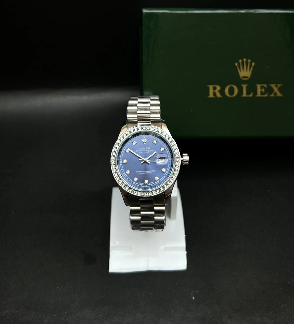 Rolex Oyster Perpetual Datejust with a stunning sunburst blue dial accented by diamond hour markers