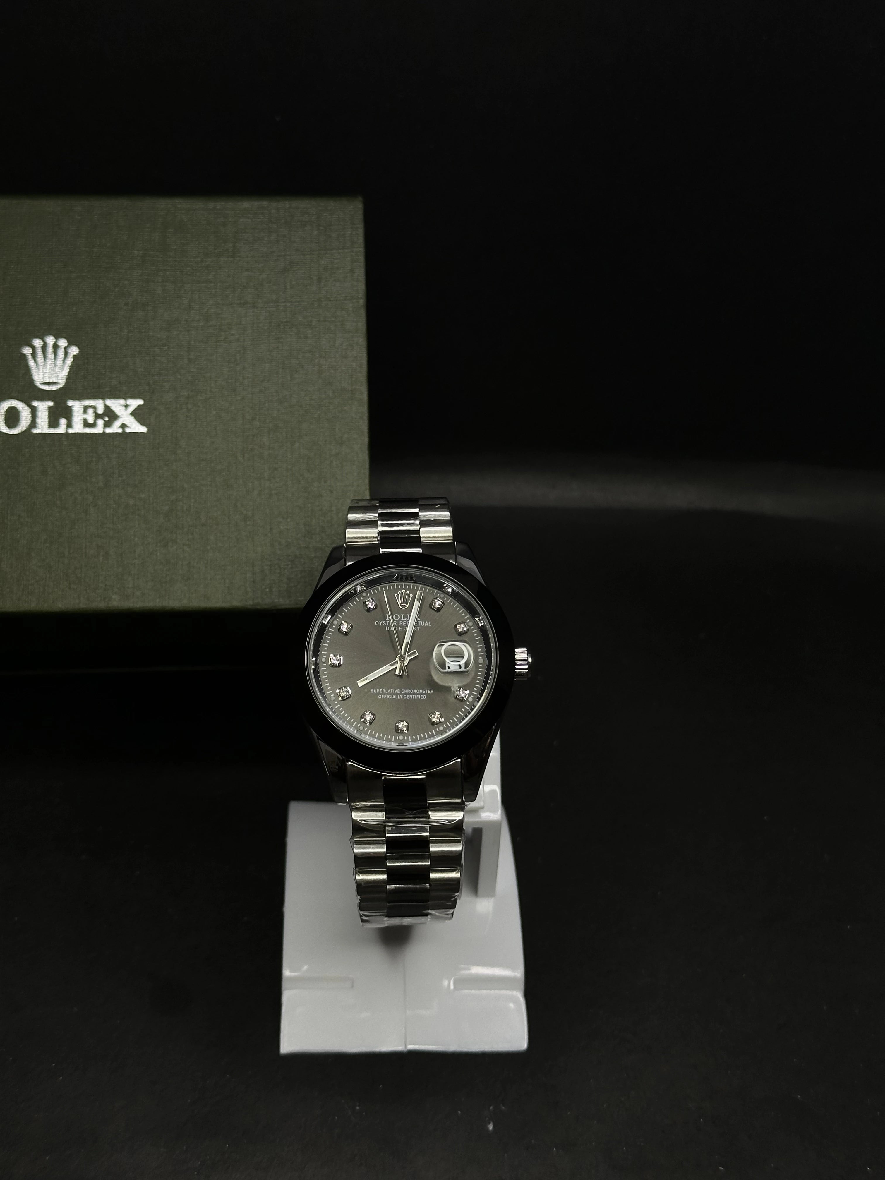 Rolex Oyster Perpetual Datejust with Black Dial and Diamond Hour Markers