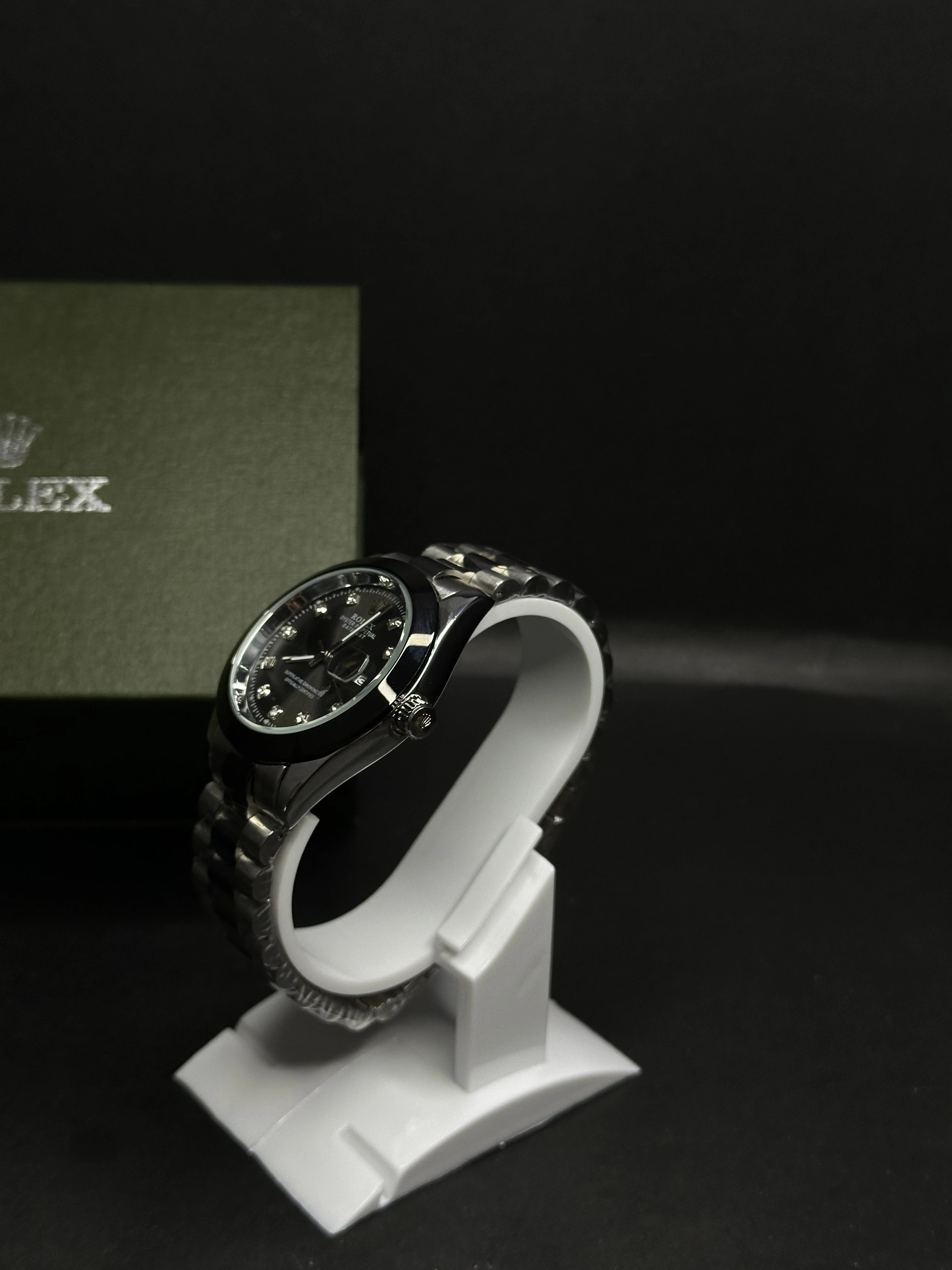Rolex Oyster Perpetual Datejust with Black Dial and Diamond Hour Markers