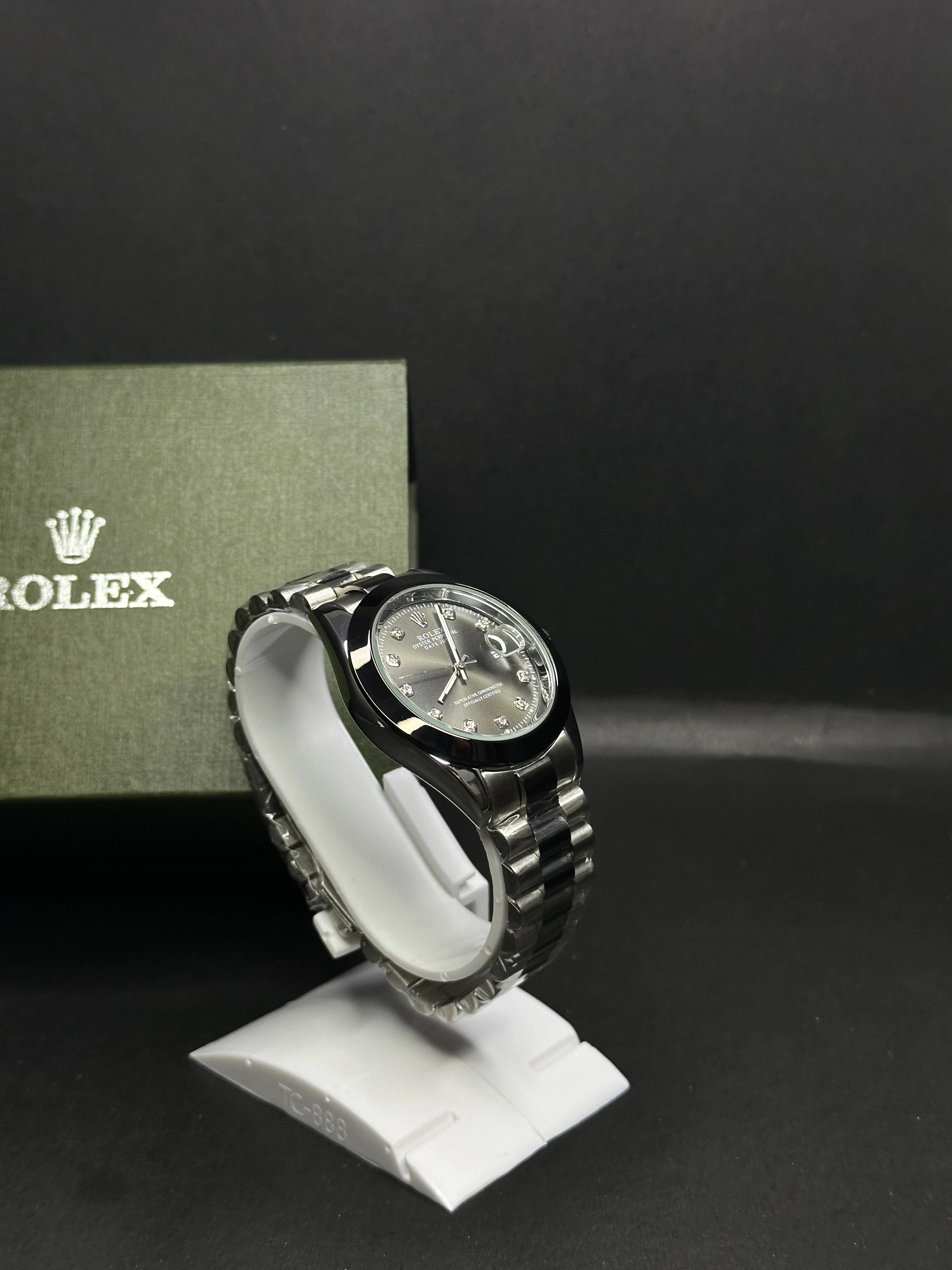 Rolex Oyster Perpetual Datejust with Black Dial and Diamond Hour Markers